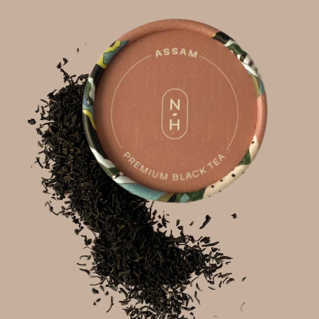 Naturally Healthful premium black Assam tea cylinder lid with loose leaf
